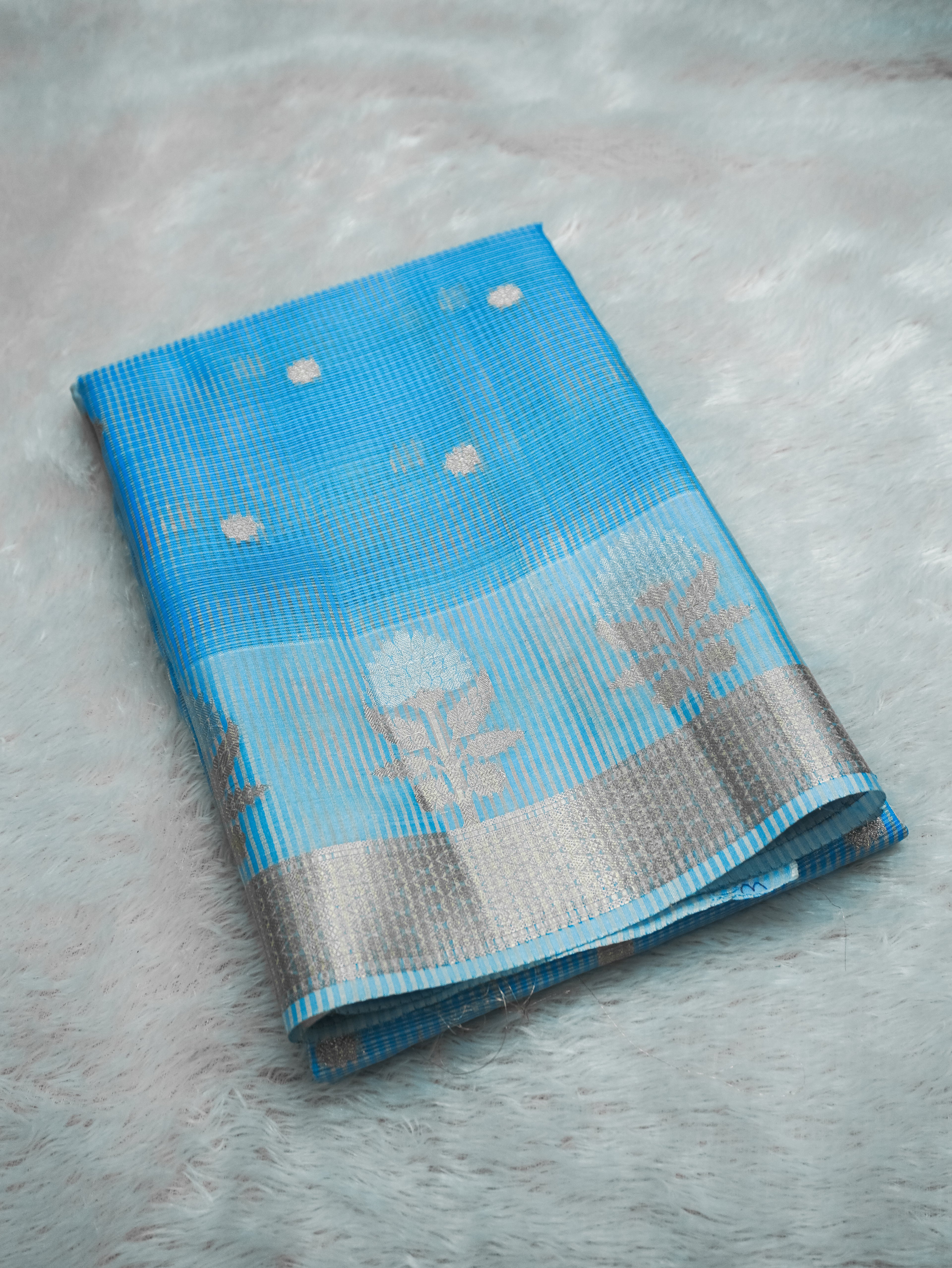 Sky Blue Tissue Banarasi Saree with Floral Buti & Silver Zari Border