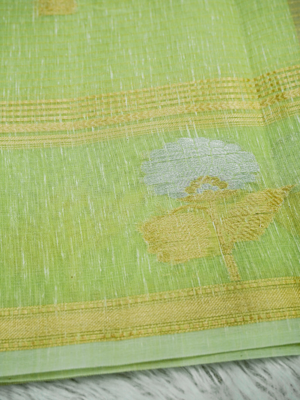 Parrot Green Linen Banarasi Saree with Floral Buta & Rich Zari Border