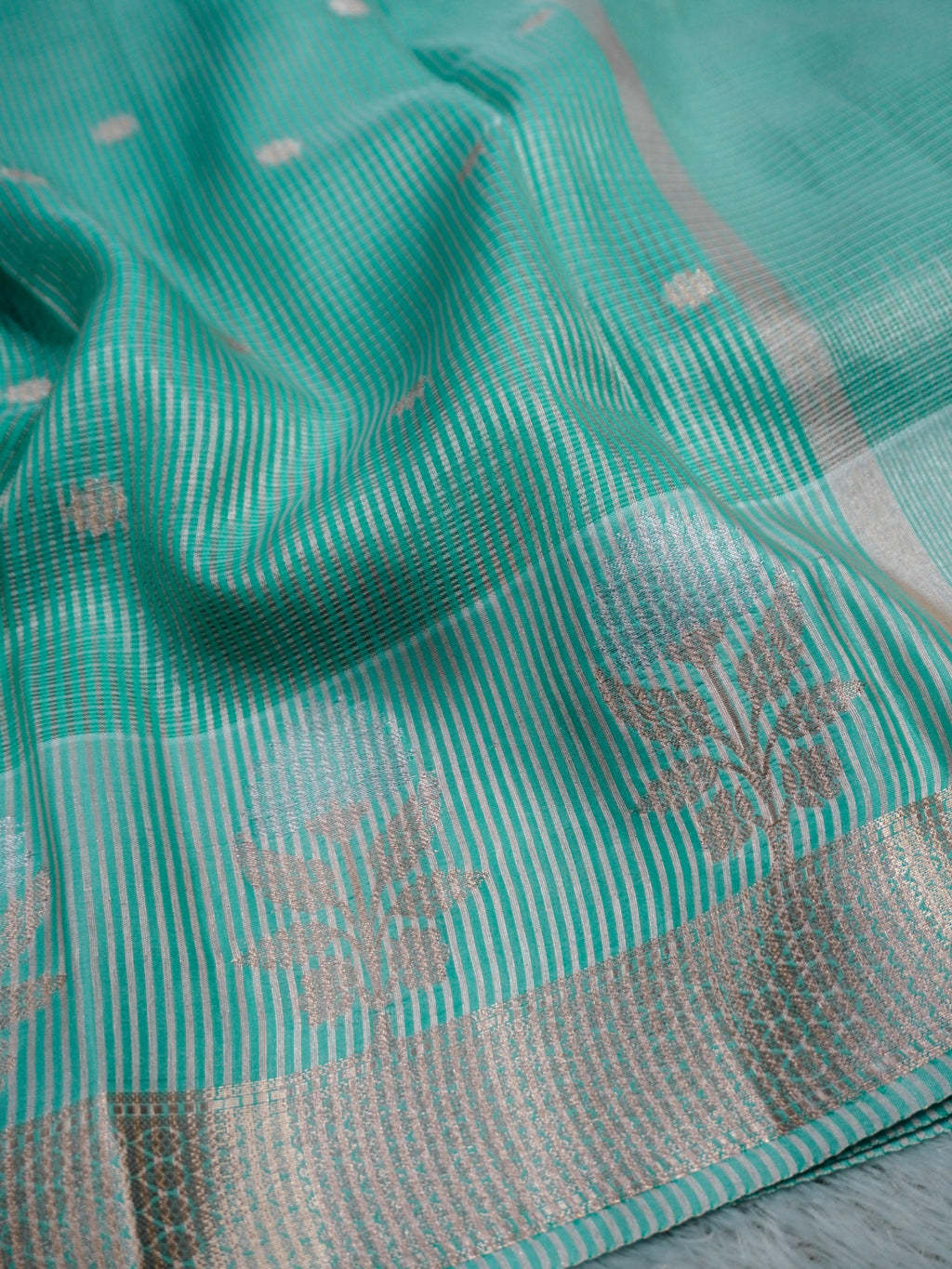 Aqua Green Tissue Banarasi Saree with Floral Buti & Silver Zari Border