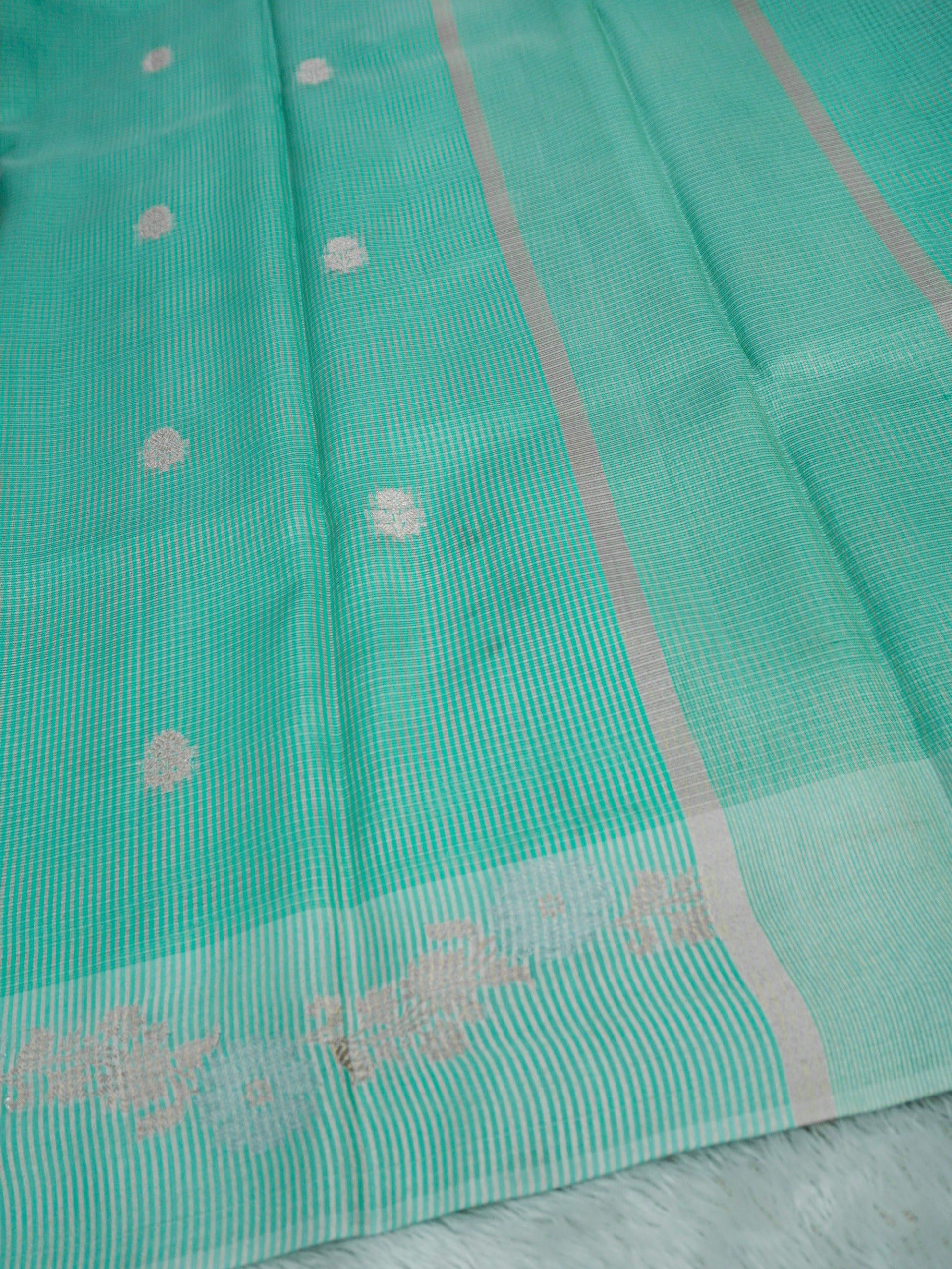 Mint Green Tissue Banarasi Saree with Floral Buti & Silver Zari Border