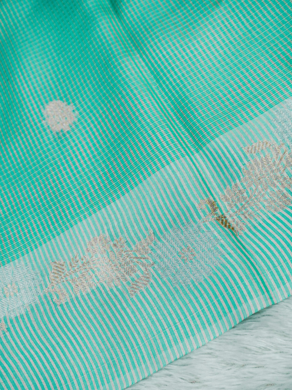 Mint Green Tissue Banarasi Saree with Floral Buti & Silver Zari Border